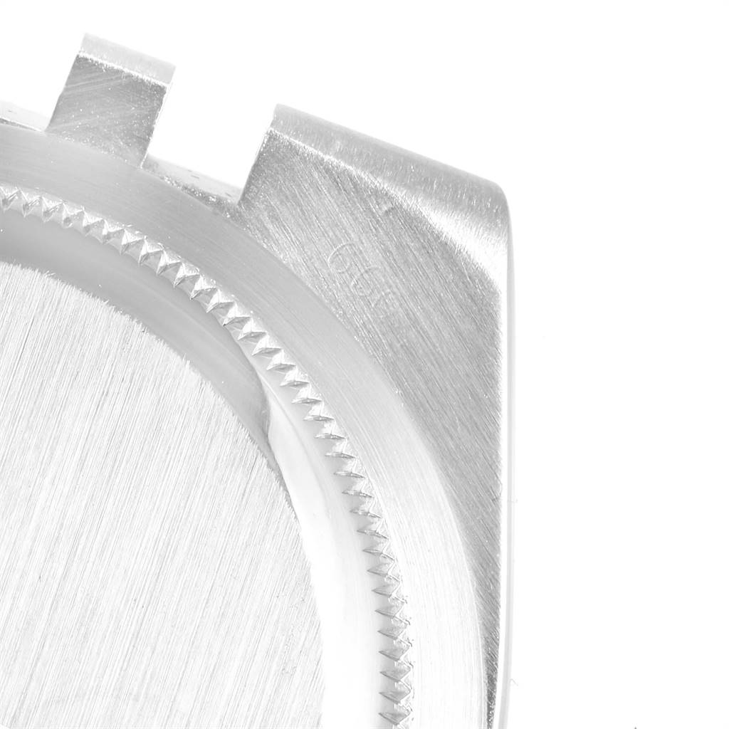 The image shows a close-up of the case and bezel area of a Rolex Oysterquartz 19601 Men's Stainless Steel White Dial 19601 Men's Stainless Steel White Dial watch.