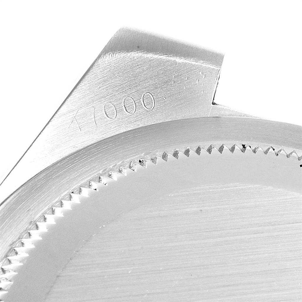 The image shows a close-up of the bezel and lug of a Rolex Oysterquartz 17000 Men
s Stainless Steel Silver Dial 17000 Men
s Stainless Steel Silver Dial watch.