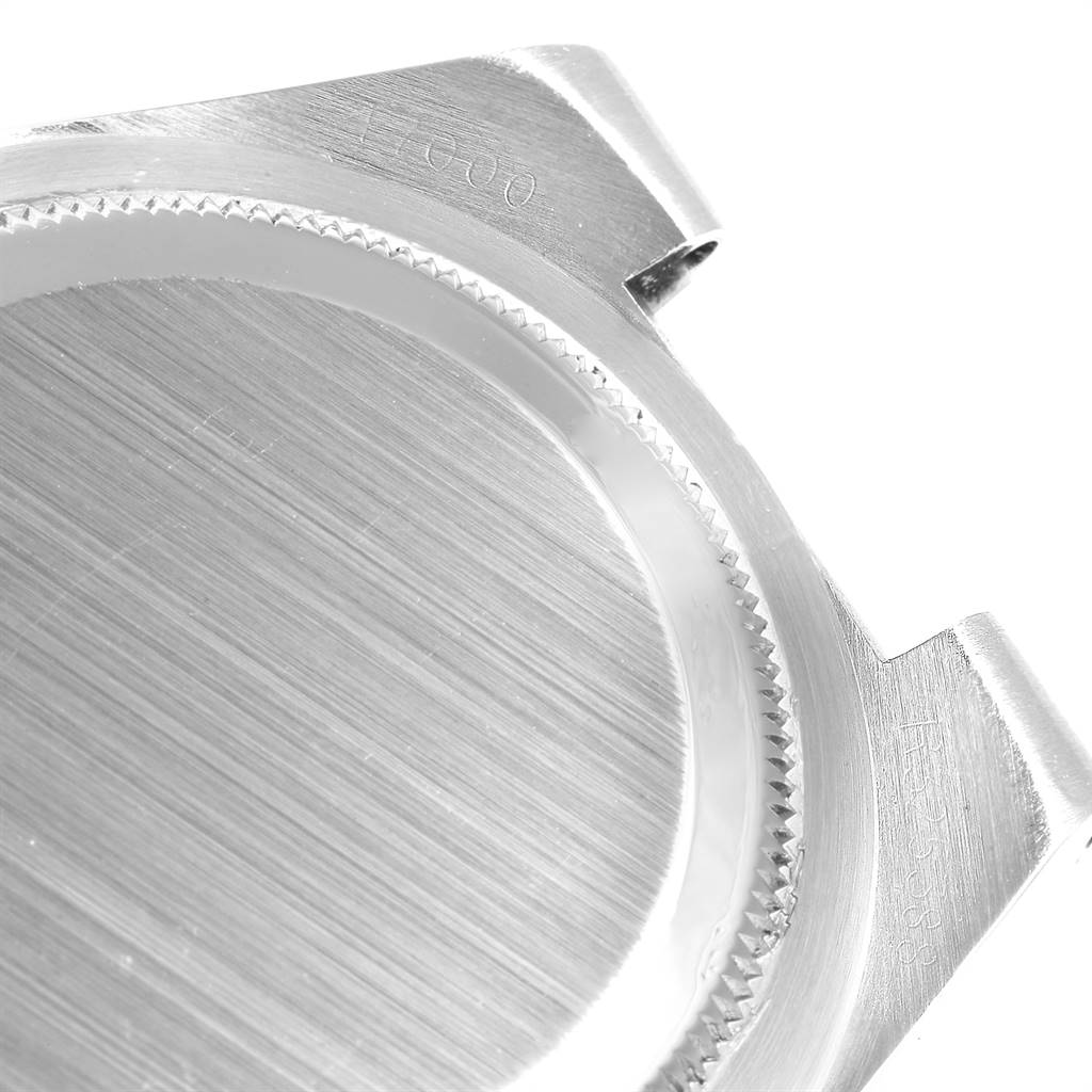 The image shows the back case of a Rolex Oysterquartz 17000 Men
s Stainless Steel Silver Dial 17000 Men
s Stainless Steel Silver Dial model watch from an angled top-down view.