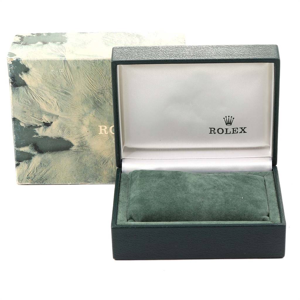 The image shows an open Rolex Oysterquartz 17000 Men
s Stainless Steel Silver Dial 17000 Men
s Stainless Steel Silver Dial watch box with the brand logo, including the outer packaging on the left side.