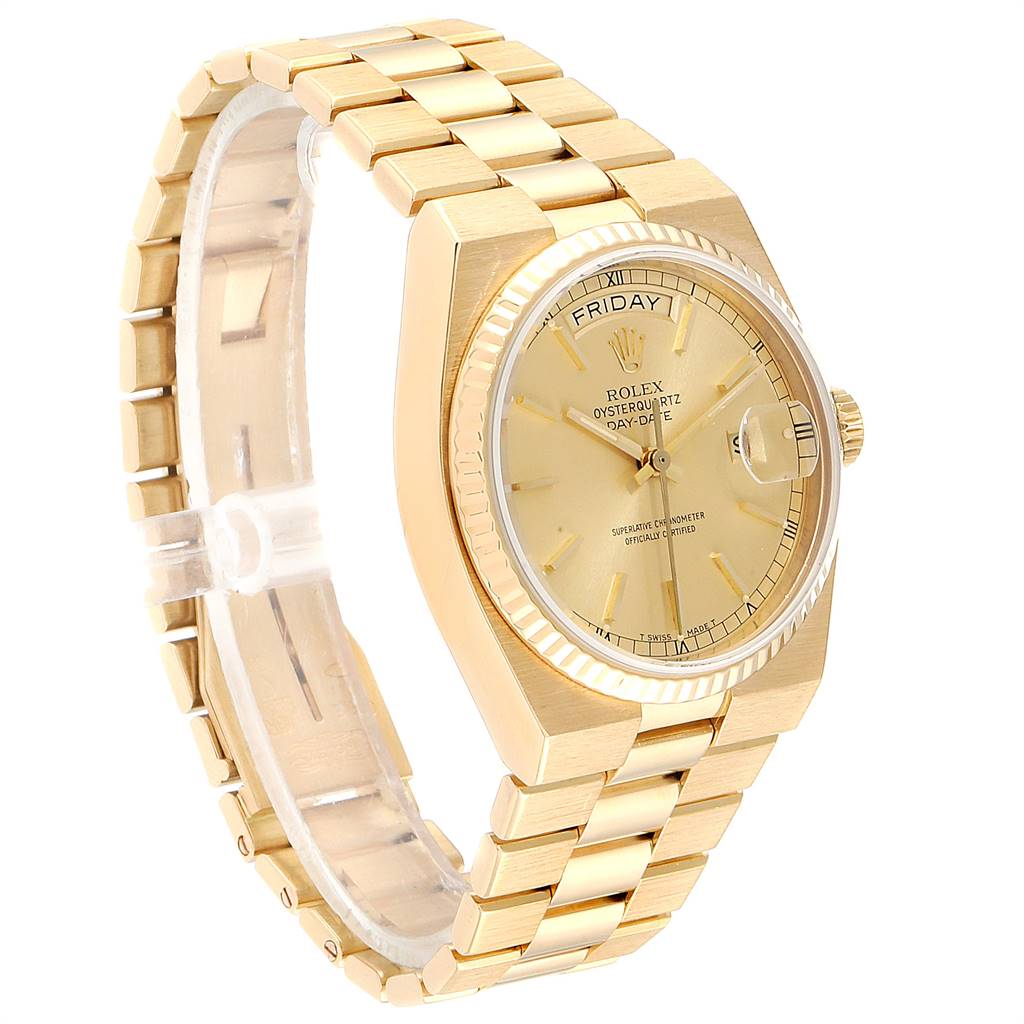 This image shows a Rolex Oysterquartz 19018 Men
s Yellow Gold Champagne Dial 19018 Men
s Yellow Gold Champagne Dial watch angled to display the watch face, crown, and bracelet.