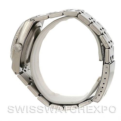 The image shows a side view of a Rolex Oysterquartz 17014 Men's Stainless Steel Silver Dial 17014 Men's Stainless Steel Silver Dial watch, highlighting the case and bracelet.