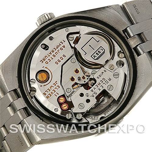 The image shows the back of a Rolex Oysterquartz 17014 Men's Stainless Steel Silver Dial 17014 Men's Stainless Steel Silver Dial watch, revealing its internal movement and components.