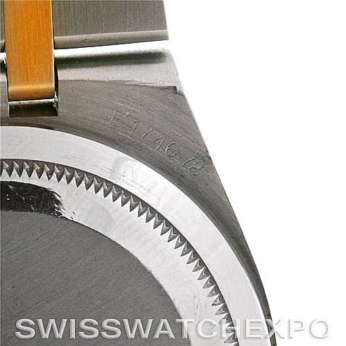 This image shows a close-up of the back case and part of the bracelet of a Rolex Oysterquartz 17013 Men's Stainless Steel White Dial 17013 Men's Stainless Steel White Dial model watch, with a serial number visible.