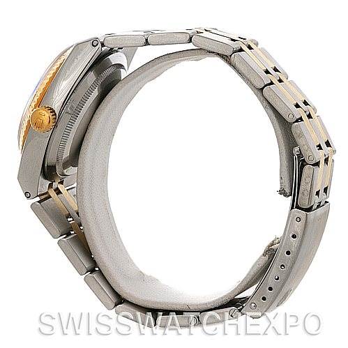 The Rolex Oysterquartz 17013 Men's Stainless Steel Champagne Dial 17013 Men's Stainless Steel Champagne Dial watch is shown from a side angle, highlighting the crown, bezel, and two-tone bracelet.