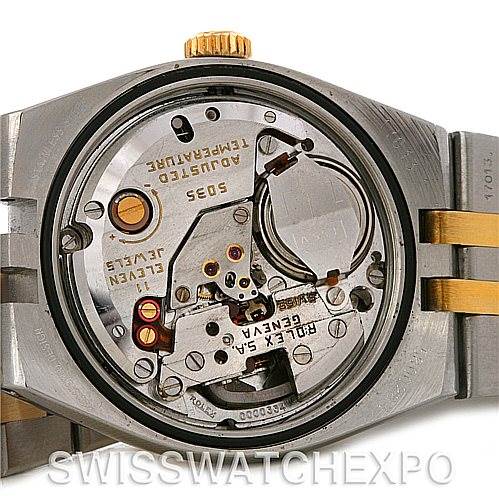 This image shows the back view of a Rolex Oysterquartz 17013 Men's Stainless Steel Champagne Dial 17013 Men's Stainless Steel Champagne Dial watch, highlighting its internal mechanism and components.