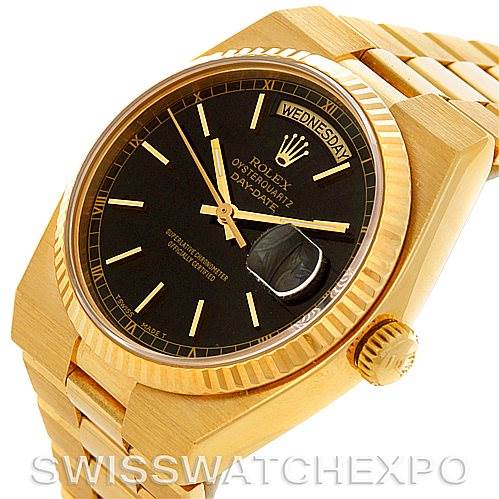 The image shows a close-up angle of a Rolex President 19018 Men's Yellow Gold Black Dial 19018 Men's Yellow Gold Black Dial model watch, focusing on its black dial, day-date windows, and gold bracelet.