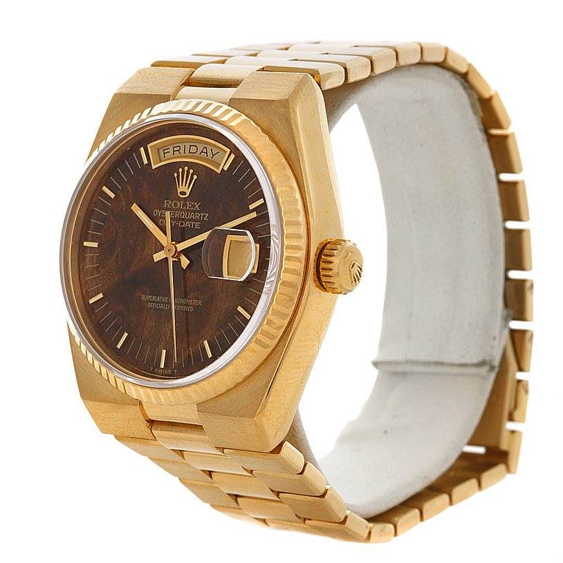 The image shows a Rolex Oysterquartz 19018 Men
s Yellow Gold Champagne Dial 19018 Men
s Yellow Gold Champagne Dial watch at a right-side angle, displaying the face, bezel, crown, and partial bracelet.