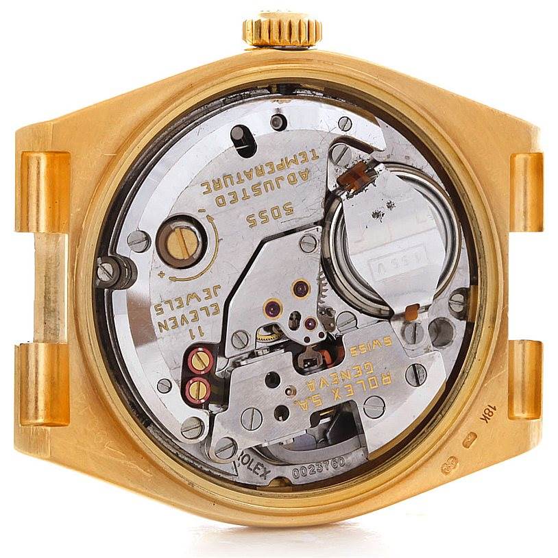 The image shows the internal mechanism of a Rolex Oysterquartz 19018 Men
s Yellow Gold Champagne Dial 19018 Men
s Yellow Gold Champagne Dial watch from a back angle.