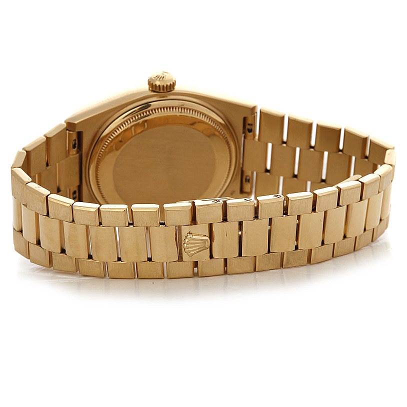 This image shows the back and bracelet of a Rolex Oysterquartz 19018 Men
s Yellow Gold Champagne Dial 19018 Men
s Yellow Gold Champagne Dial watch at a rear angle.