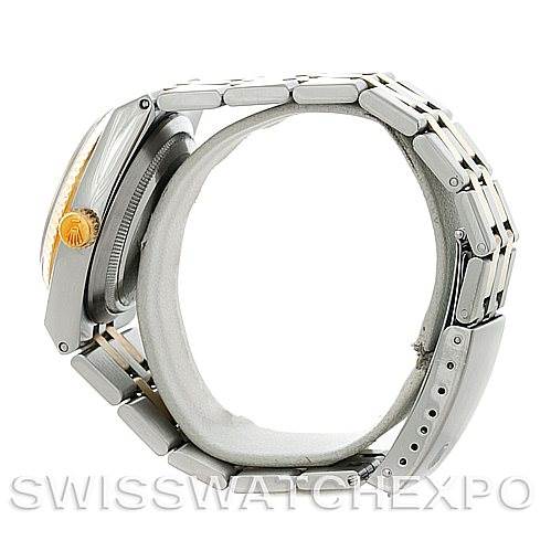 The image shows a side view of a Rolex Oysterquartz 17013 Men's Stainless Steel Silver Dial 17013 Men's Stainless Steel Silver Dial watch, highlighting the crown, case, and bracelet.