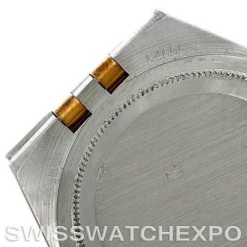 The image shows a close-up, angled view of the back case of a Rolex Oysterquartz 17013 Men's Stainless Steel Silver Dial 17013 Men's Stainless Steel Silver Dial watch, highlighting the serial numbers and metal joints.