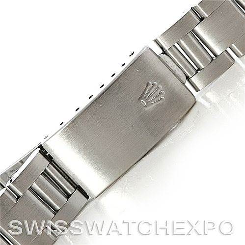 The image shows the clasp of a Rolex Oysterquartz 14000 Men's Stainless Steel Black Dial 14000 Men's Stainless Steel Black Dial watch, featuring the Rolex logo.