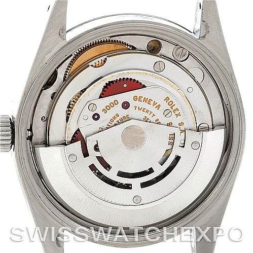 The image shows the back casing removed from a Rolex Oysterquartz 14000 Men's Stainless Steel Black Dial 14000 Men's Stainless Steel Black Dial watch, revealing the intricate internal mechanical components.