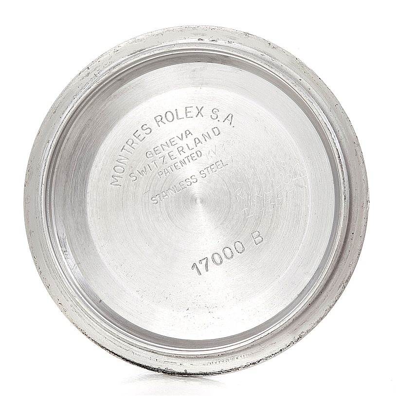 This image shows the inside case back of a Rolex Oysterquartz 17000 Men's Stainless Steel White Dial 17000 Men's Stainless Steel White Dial model watch, engraved with model and brand details.