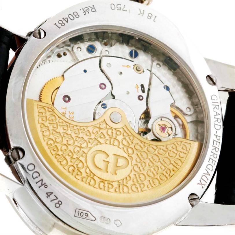 This image shows the back view of a Girard Perregaux Cat's Eye 18K White Gold Diamond Watch 80481 model, highlighting the movement and internal mechanisms.