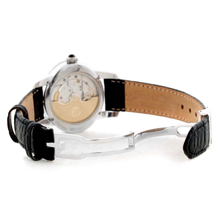 This image shows the back view of a Girard Perregaux Cat's Eye 18K White Gold Diamond Watch 80481 model with its movement and leather strap visible.