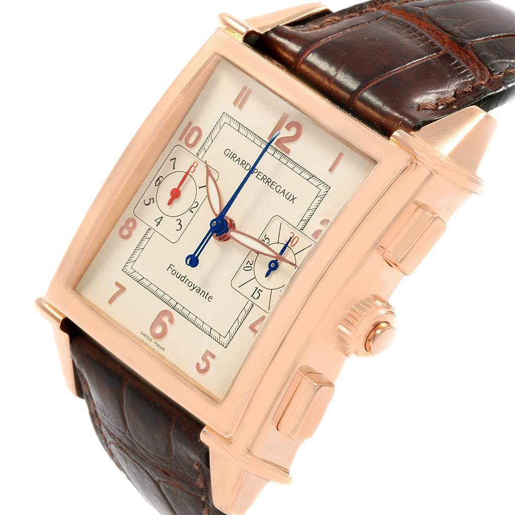 The image shows a front and slightly angled side view of a Girard Perregaux 1945 Rose Gold Split Second Chrono Watch 9021 model by Girard-Perregaux 9021 Men's Rose Gold Silver Dial 9021 Men's Rose Gold Silver Dial.