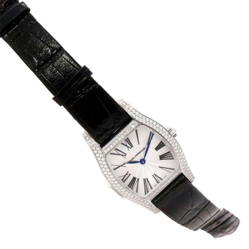 The image shows a front and slight angle view of the Girard-Perregaux 2656 Women's Stainless Steel Silver Dial 2656 Women's Stainless Steel Silver Dial Tortue Stainless Steel Diamond Ladies Watch 2656 with a black strap.
