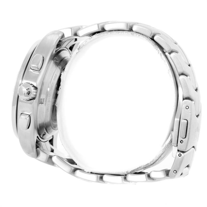 The image shows a side view of a Tag Heuer Link CJF211A.BA0594 Men's Stainless Steel Black Dial CJF211A.BA0594 Men's Stainless Steel Black Dial model watch, highlighting its buttons, crown, and stainless steel bracelet.