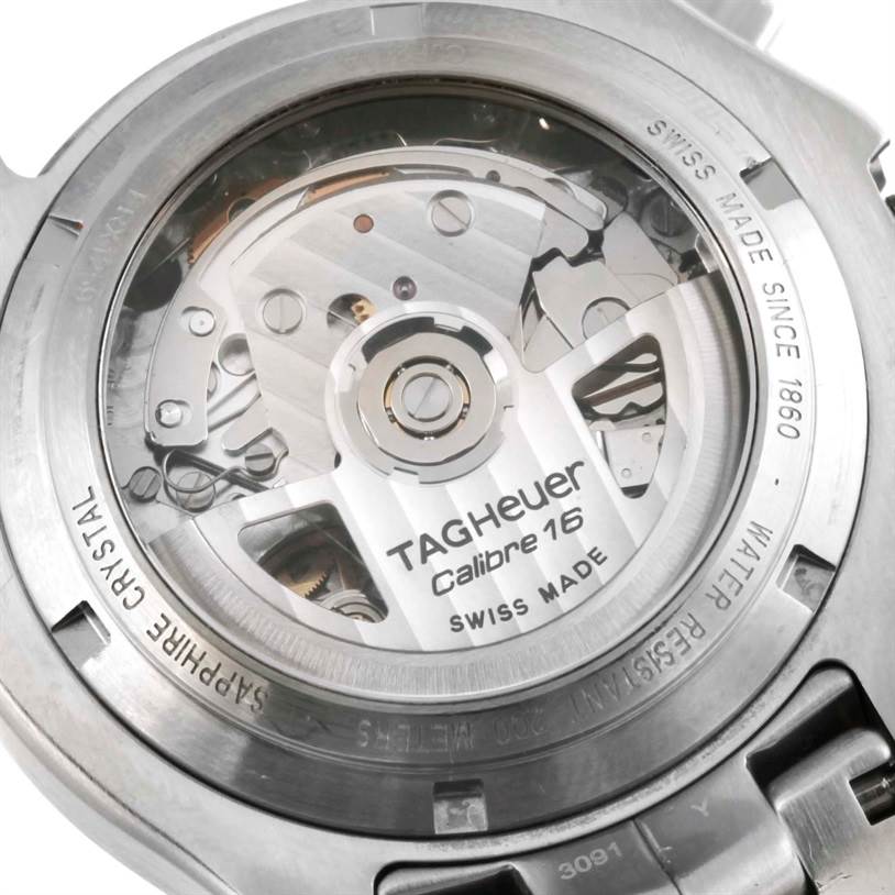 The image shows the back view of the Tag Heuer Link CJF211A.BA0594 Men's Stainless Steel Black Dial CJF211A.BA0594 Men's Stainless Steel Black Dial watch, showcasing its Calibre 16 movement through a transparent case back.