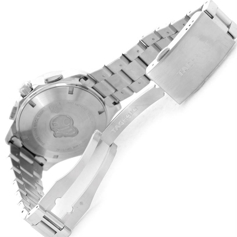 The image shows the back and clasp of a Tag Heuer Aquaracer CAP2110.BA0833 Men's Stainless Steel Black Dial CAP2110.BA0833 Men's Stainless Steel Black Dial watch, highlighting the metal bracelet and engraved case back.