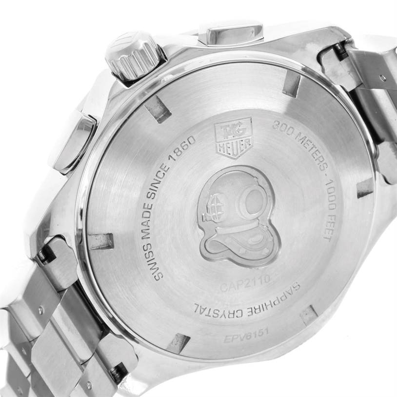 This is an image of the back case of a Tag Heuer Aquaracer CAP2110.BA0833 Men's Stainless Steel Black Dial CAP2110.BA0833 Men's Stainless Steel Black Dial watch showing the engraved logo, text, and bracelet attachment.