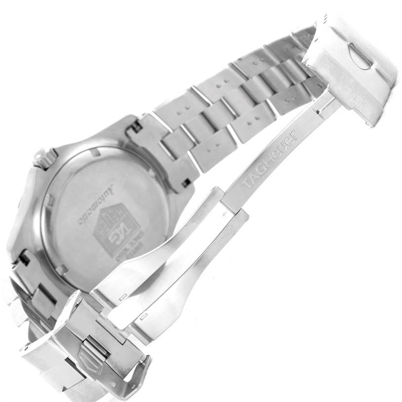 The image shows the back case and partially open bracelet of a Tag Heuer Aquaracer WN2110.BA0359 Men's Stainless Steel Silver Dial WN2110.BA0359 Men's Stainless Steel Silver Dial watch from a side angle.