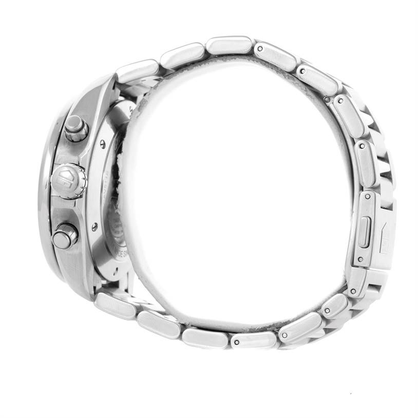 The image shows a side view of a Tag Heuer Carrera CAV511B Men's Stainless Steel Silver Dial CAV511B Men's Stainless Steel Silver Dial watch highlighting the crown, pushers, and the metal bracelet links.