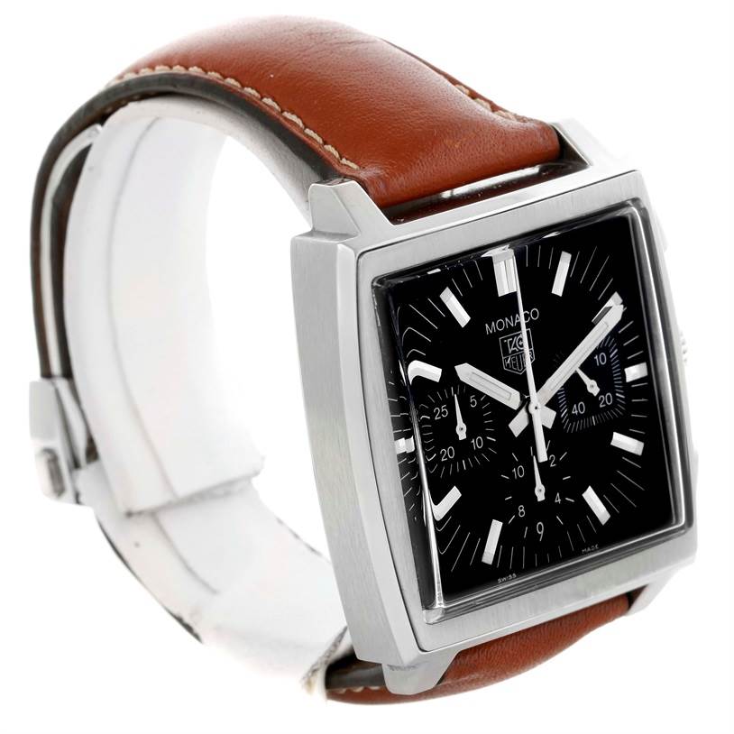 This image shows a Tag Heuer Monaco CW2111 Men's Stainless Steel Black Dial CW2111 Men's Stainless Steel Black Dial watch from a front-side angle, highlighting its square dial and brown leather strap.