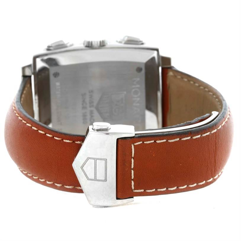 The image shows the back view of the Tag Heuer Monaco CW2111 Men's Stainless Steel Black Dial CW2111 Men's Stainless Steel Black Dial watch, highlighting its leather strap and clasp.