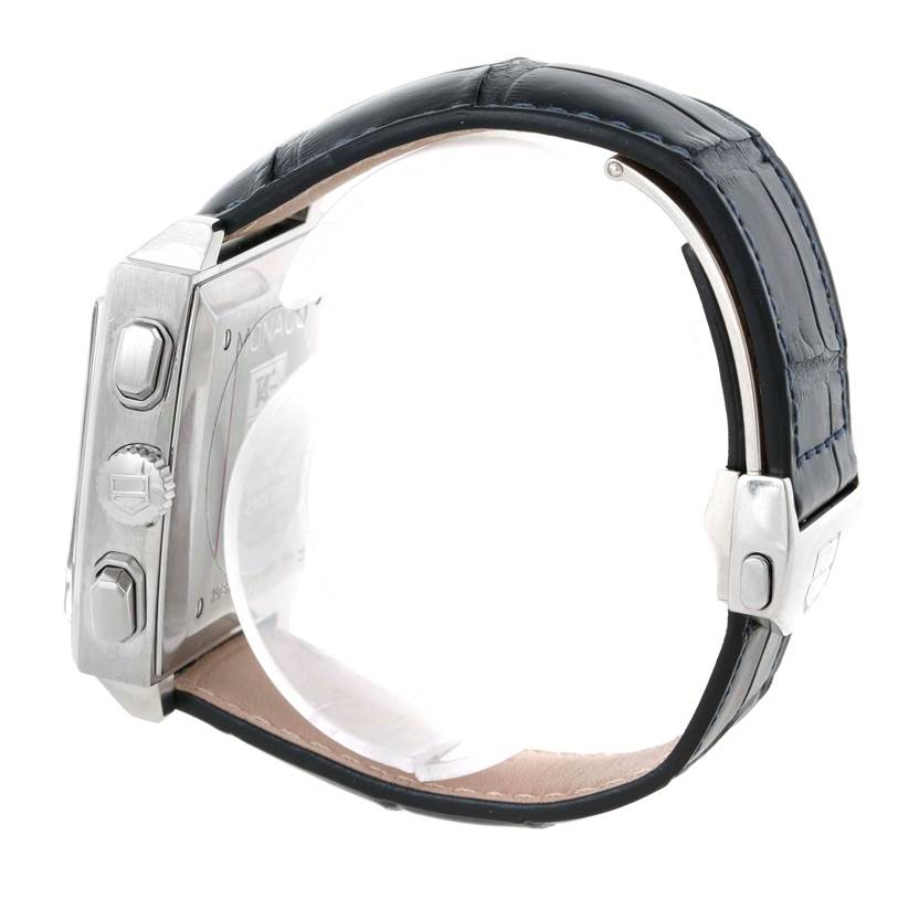 The image shows a side view of the Tag Heuer Monaco CW2113 Men's Stainless Steel Blue Dial CW2113 Men's Stainless Steel Blue Dial watch, highlighting its crown, pushers, and leather strap.