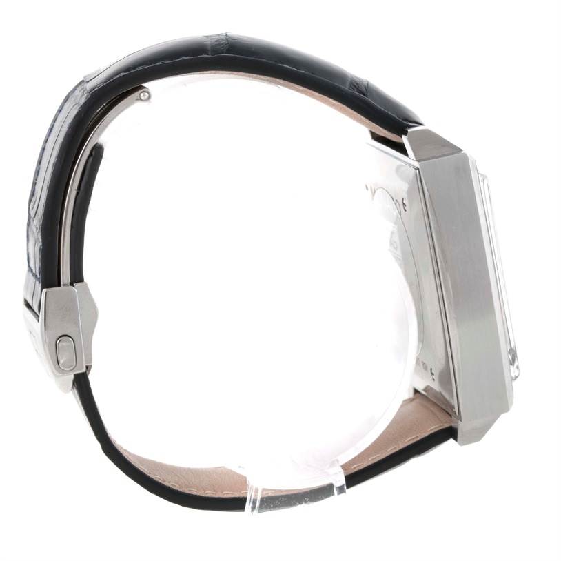 This image shows a side view of the Tag Heuer Monaco CW2113 Men's Stainless Steel Blue Dial CW2113 Men's Stainless Steel Blue Dial watch, highlighting the case, strap, and clasp.