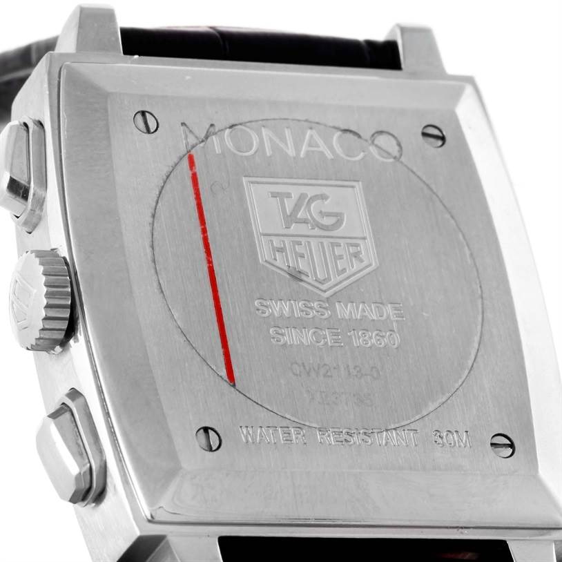 The image shows the back casing of a Tag Heuer Monaco CW2113 Men's Stainless Steel Blue Dial CW2113 Men's Stainless Steel Blue Dial watch, featuring the brand logo and water resistance details.