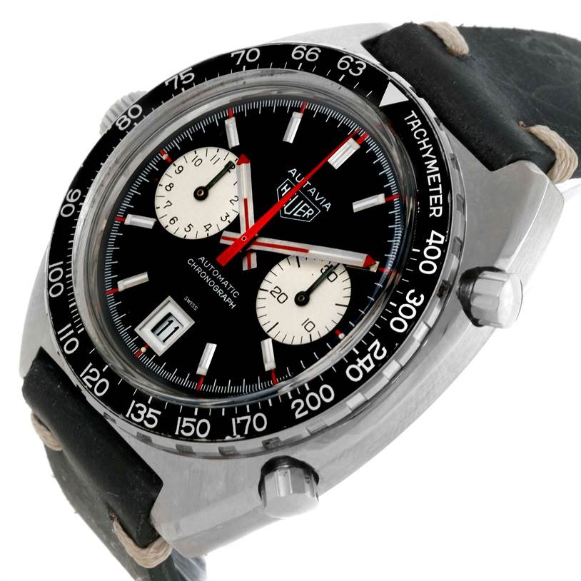 The Tag Heuer Autavia 1163 Men's Stainless Steel Black Dial 1163 Men's Stainless Steel Black Dial watch is shown at an angled view, highlighting its black dial, chronograph subdials, and tachymeter bezel.