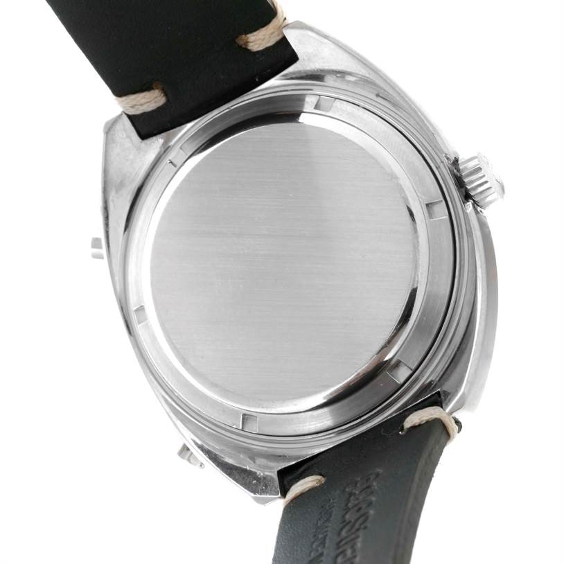 The image shows the back case and part of the strap of a Tag Heuer Autavia 1163 Men's Stainless Steel Black Dial 1163 Men's Stainless Steel Black Dial watch from a rear angle.