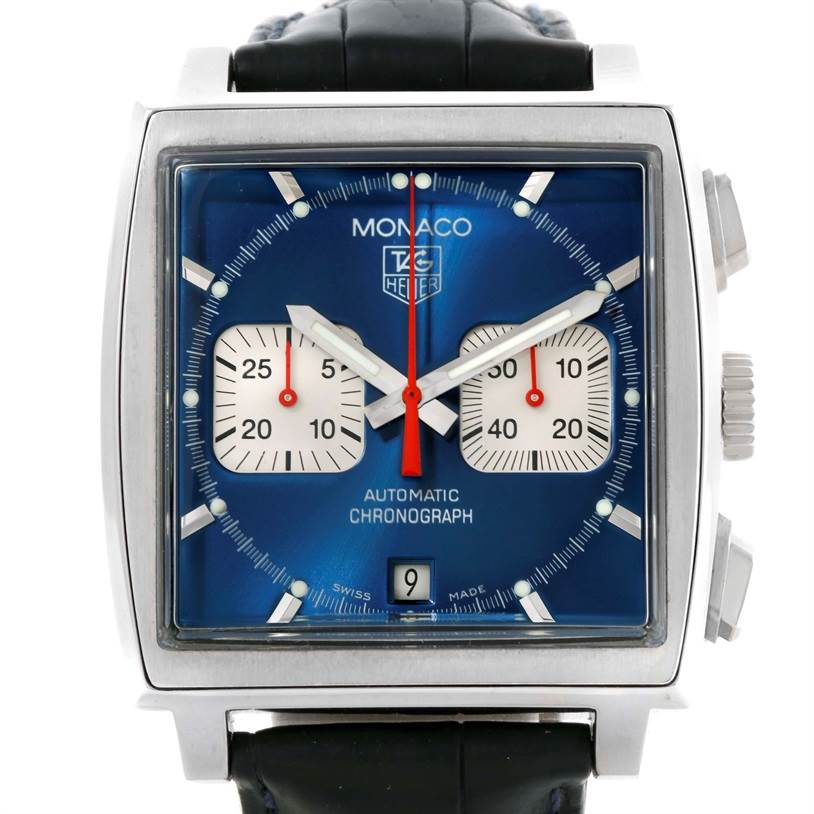 The image shows a front view of the Tag Heuer Monaco CW2113 Men's Stainless Steel Blue Dial CW2113 Men's Stainless Steel Blue Dial watch, highlighting its blue face, subdials, and date window.