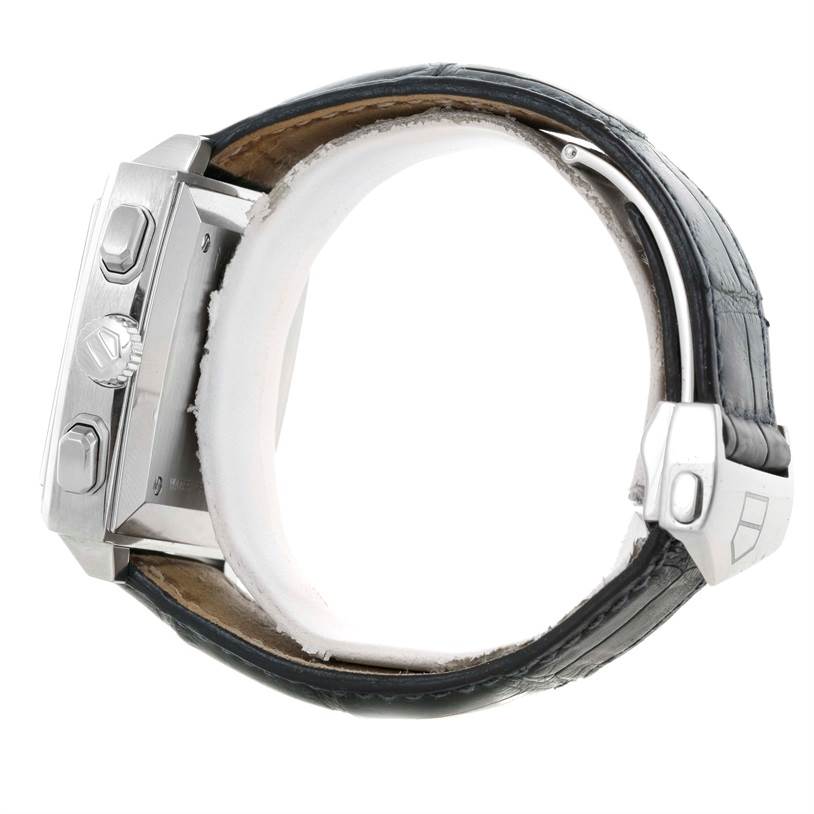 The image shows a side profile of the Tag Heuer Monaco CW2113 Men's Stainless Steel Blue Dial CW2113 Men's Stainless Steel Blue Dial watch, highlighting the crown, pushers, and leather strap.