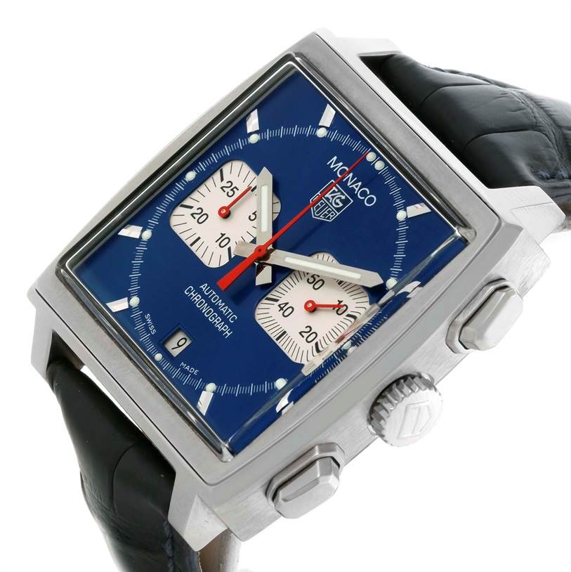 The image shows the Tag Heuer Monaco CW2113 Men's Stainless Steel Blue Dial CW2113 Men's Stainless Steel Blue Dial watch angled to display the face, crown, and chronograph pushers.