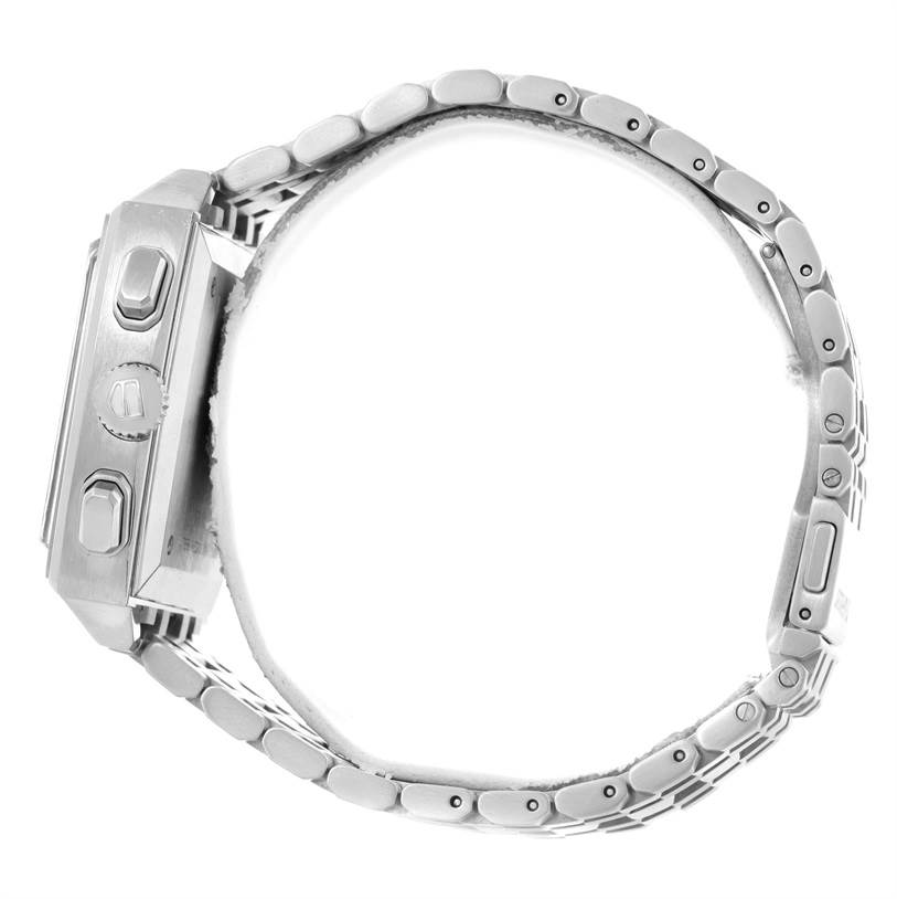 This image shows a side view of the Tag Heuer Monaco CW2113 Men's Stainless Steel Blue Dial CW2113 Men's Stainless Steel Blue Dial watch, including its buttons and the metal bracelet.