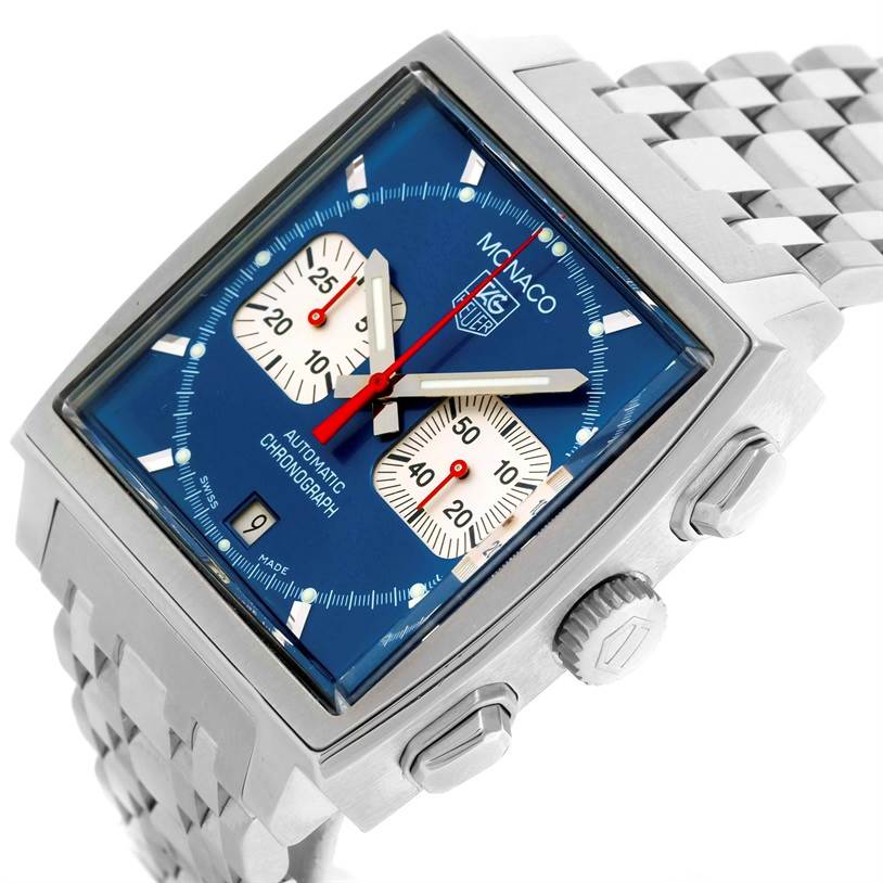 The image shows a close-up view of the front and right side of a Tag Heuer Monaco CW2113 Men's Stainless Steel Blue Dial CW2113 Men's Stainless Steel Blue Dial watch with its dial, crown, and pushers.
