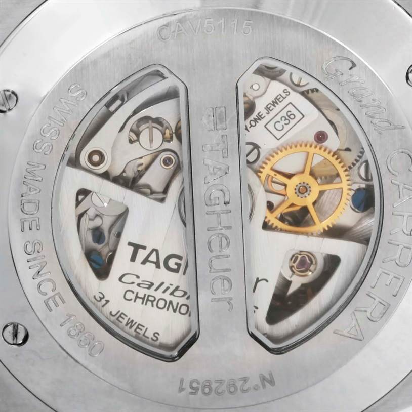 This image shows the inner mechanics and engravings of the Tag Heuer Carrera CAV5115 Men's Stainless Steel Black Dial CAV5115 Men's Stainless Steel Black Dial model viewable through its transparent case back.