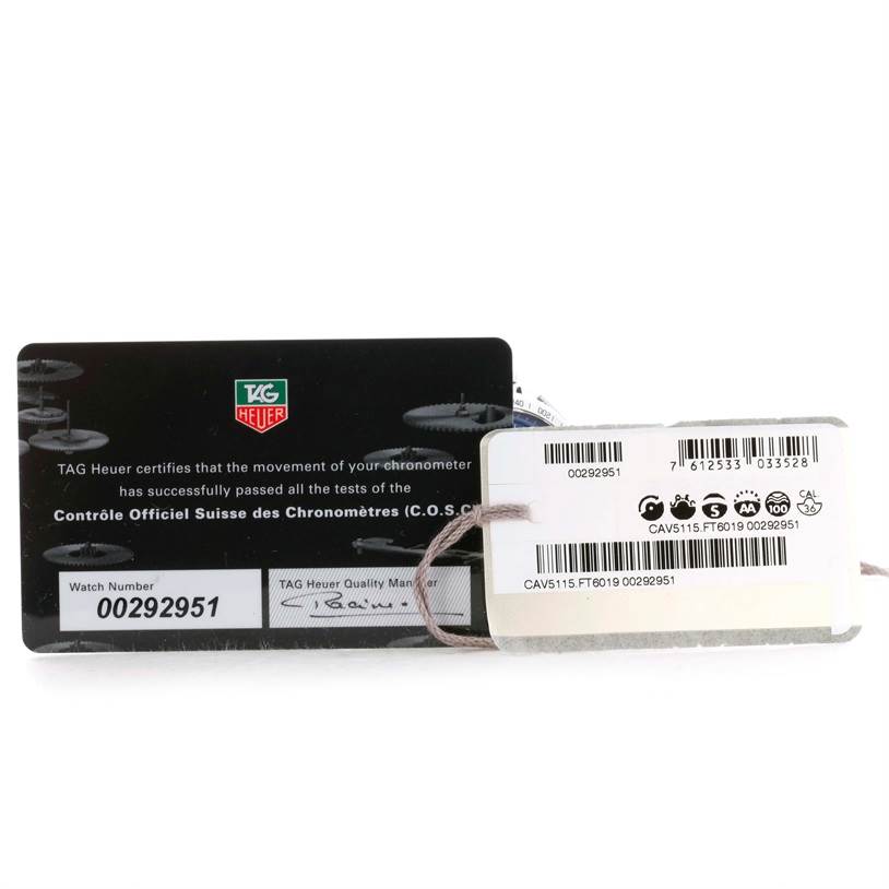 The image shows the certification card and a tag with barcodes for a Carrera model by Tag Heuer, displaying the watch number and other details.