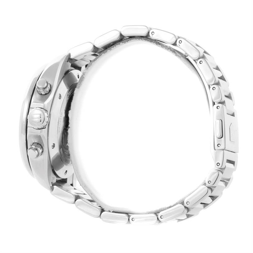 The image shows a side view of a Tag Heuer Carrera CAV511B Men's Stainless Steel Silver Dial CAV511B Men's Stainless Steel Silver Dial watch, focusing on its crown, pushers, and stainless steel bracelet.