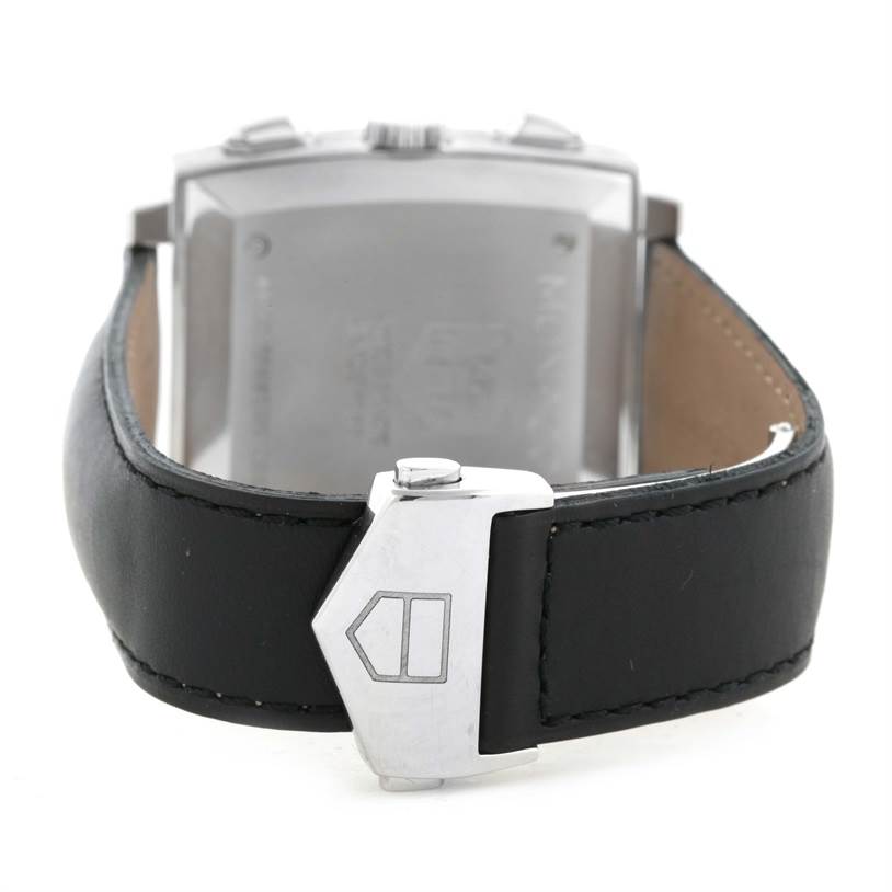 This image shows the back of the Tag Heuer Monaco CW2111 Men's Stainless Steel Black Dial CW2111 Men's Stainless Steel Black Dial watch, focusing on the clasp and leather strap.