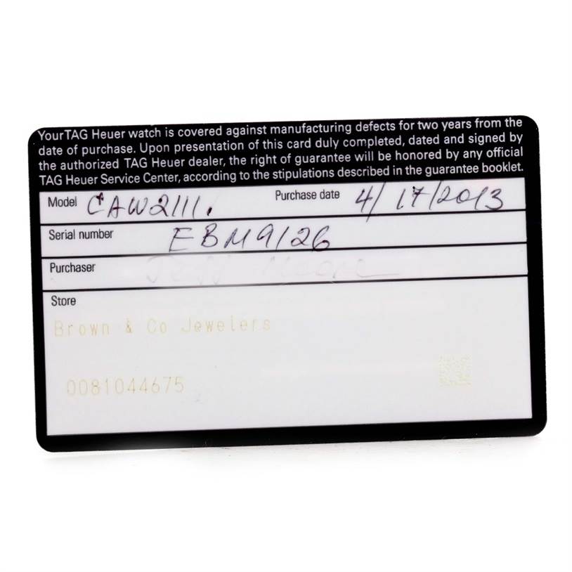 This image shows a warranty card for a Tag Heuer Monaco CAW2111 Men's Stainless Steel Blue Dial CAW2111 Men's Stainless Steel Blue Dial model CAW2111, displaying purchase details and serial number.