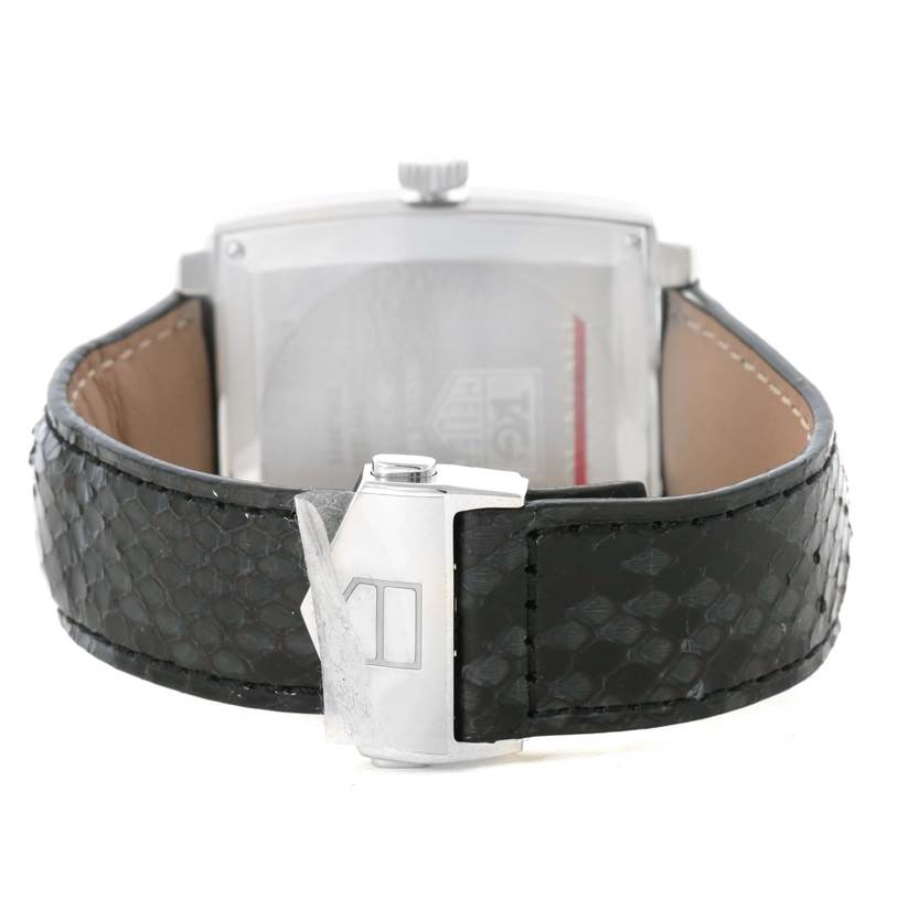 The image shows the back angle of a Tag Heuer Monaco WAW1310.FC6216 Men's Stainless Steel Black Dial WAW1310.FC6216 Men's Stainless Steel Black Dial watch, focusing on the clasp and black leather strap.