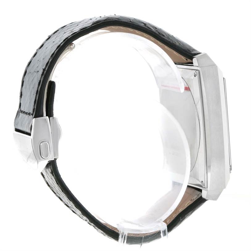 The image shows a side view of a Tag Heuer Monaco WAW1310.FC6216 Men's Stainless Steel Black Dial WAW1310.FC6216 Men's Stainless Steel Black Dial watch, highlighting its strap, clasp, and case.