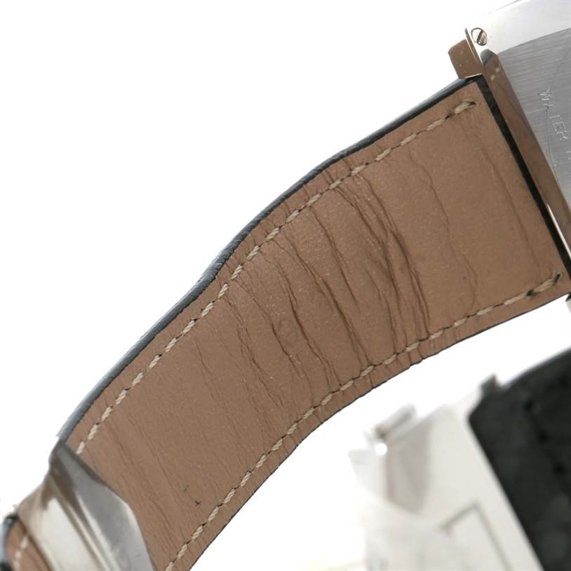 This image shows a close-up view of the leather strap and part of the case back of the Tag Heuer Monaco WAW1310.FC6216 Men's Stainless Steel Black Dial WAW1310.FC6216 Men's Stainless Steel Black Dial watch.