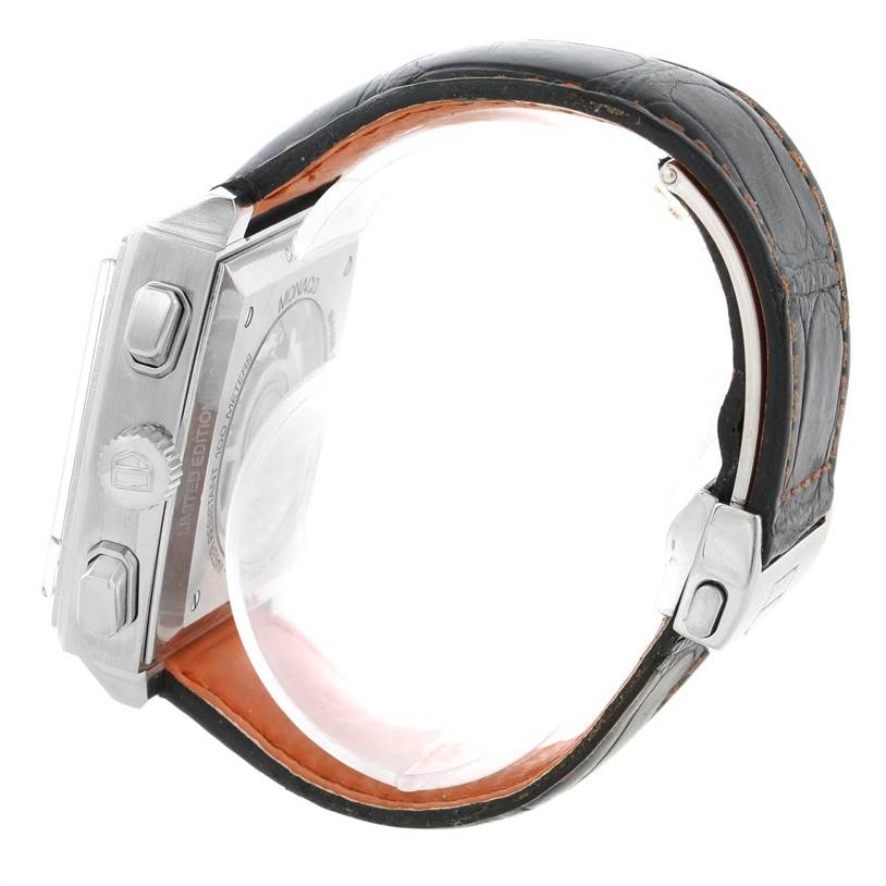 The image shows a side angle of the Limited Edition Tag Heuer watch, highlighting the case, crown, and leather strap.